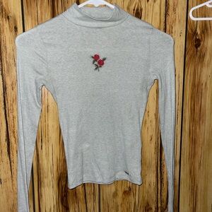 Hollister Light Gray Long Sleeve Turtleneck with Red Rose Detail